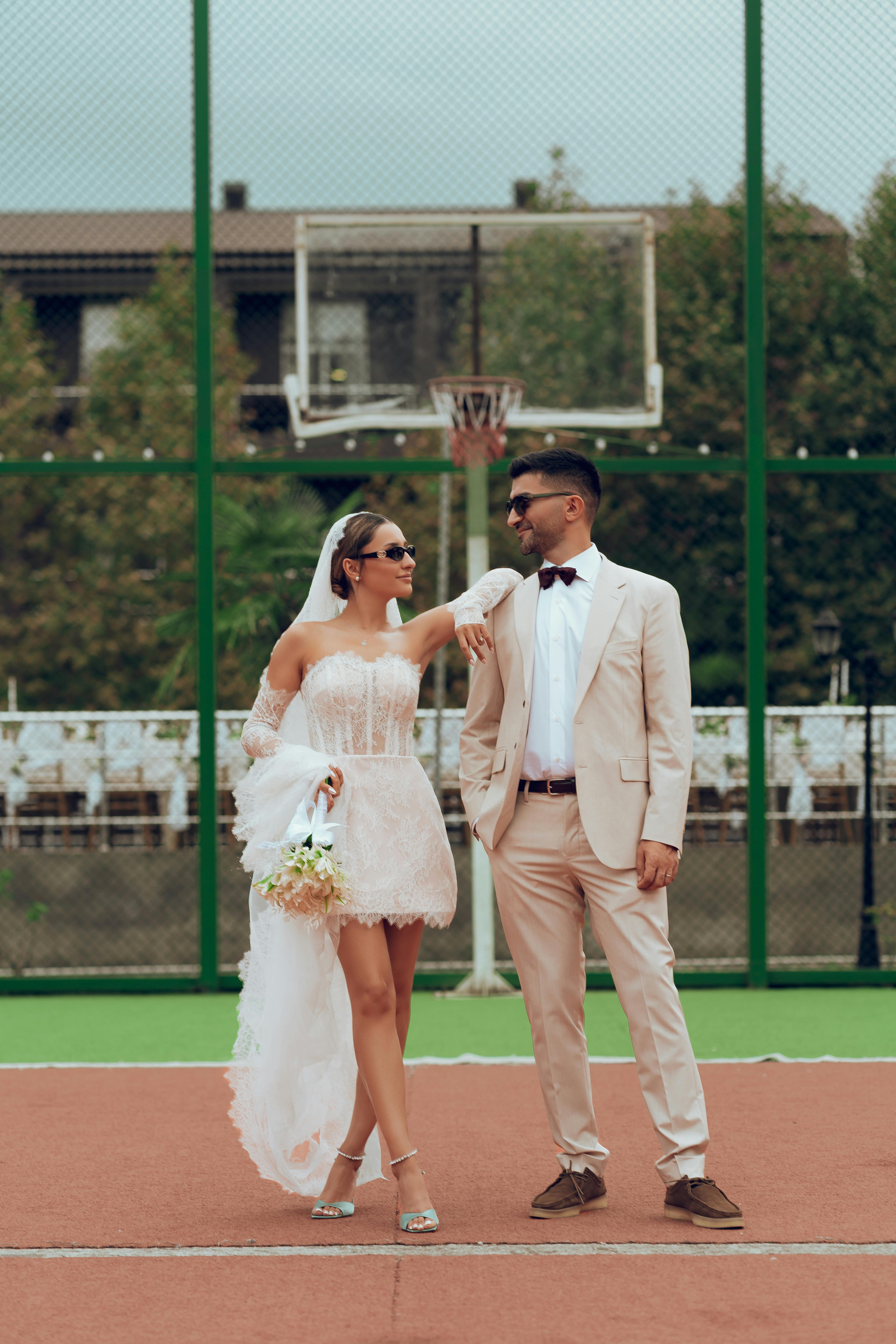 Bride and groom laughing during outdoor wedding ceremony