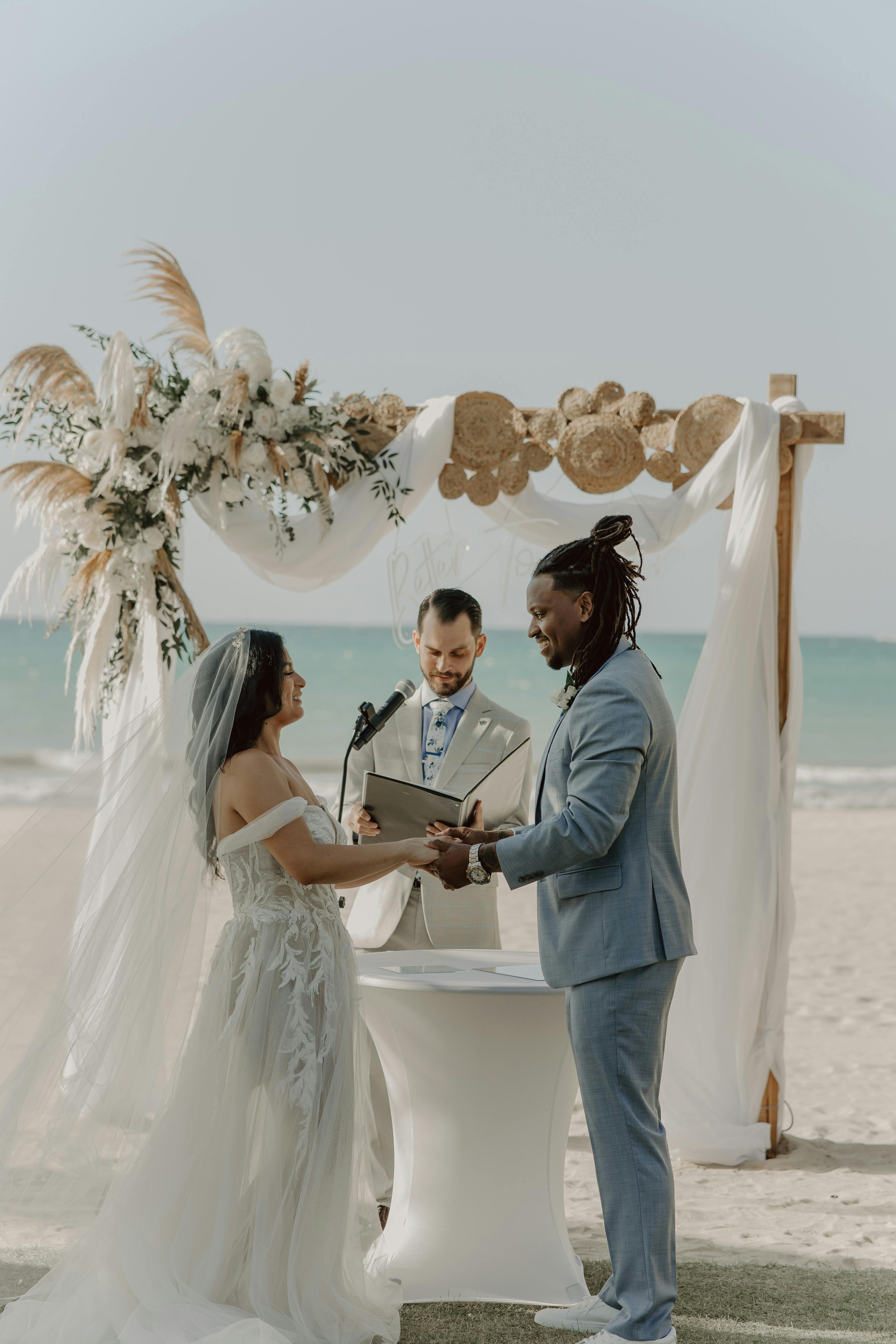 Bride and groom laughing during ceremony